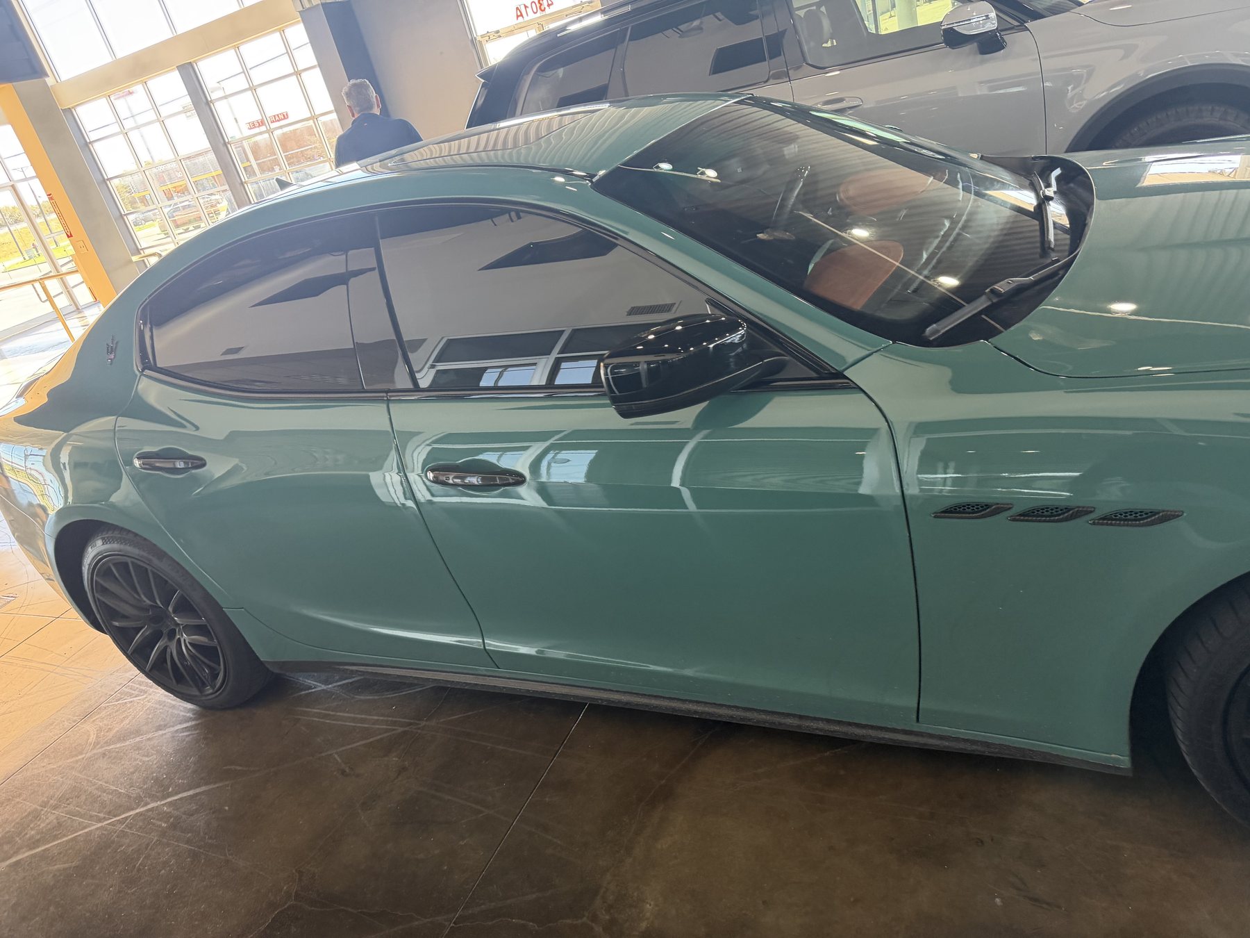 Green sedan side view